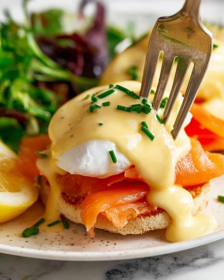 Eggs Benedict with Hollandaise Sauce, Ham, Bacon, and Smoked Salmon Recipe