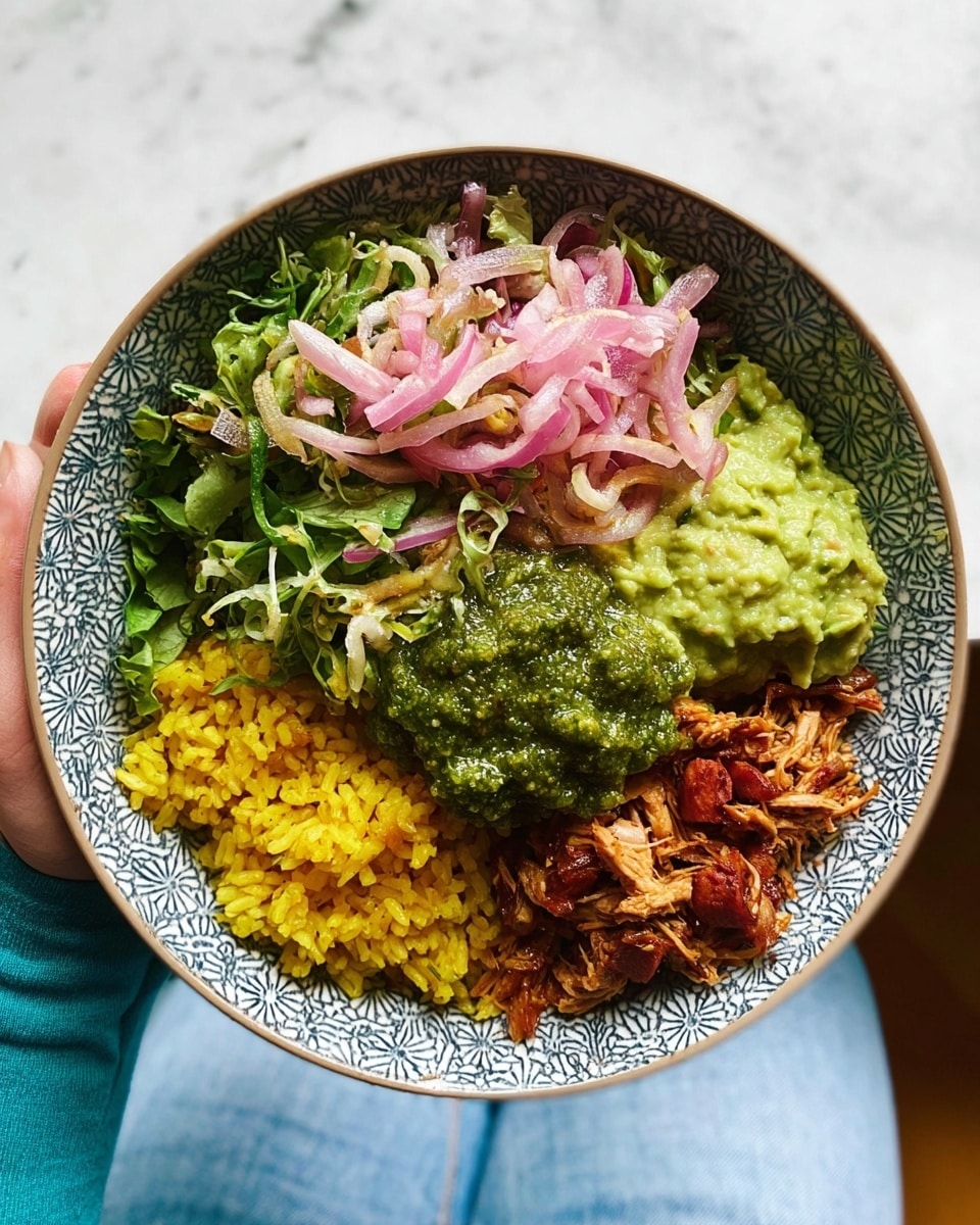 A patterned bowl held by a woman's hand shows a colorful layered dish with five distinct layers: the bottom left layer is bright yellow rice, next to it on the right is shredded reddish-brown meat, above the rice is a chunky green guacamole, slightly overlapping with a textured green herb sauce in the center, and the top layer is fresh, dark and light green leafy salad mixed with thin, curly pink and white onion strips. The bowl is held above a white marbled surface, and a person wearing light blue jeans and a teal top is visible below. photo taken with an iphone --ar 4:5 --v 7