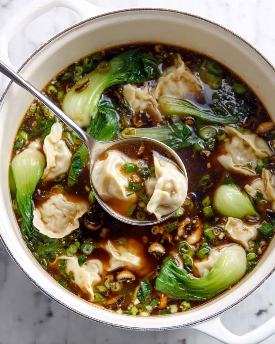 A white pot filled with clear dark brown broth with small bits of chopped mushrooms and green onions floating throughout. Inside the broth, there are pale dumplings with crimped edges scattered evenly, along with bright green leafy bok choy placed around the pot. A silver spoon lifts two dumplings above the broth, showing their soft, slightly wrinkled texture. The background is a white marbled surface. Photo taken with an iphone --ar 4:5 --v 7