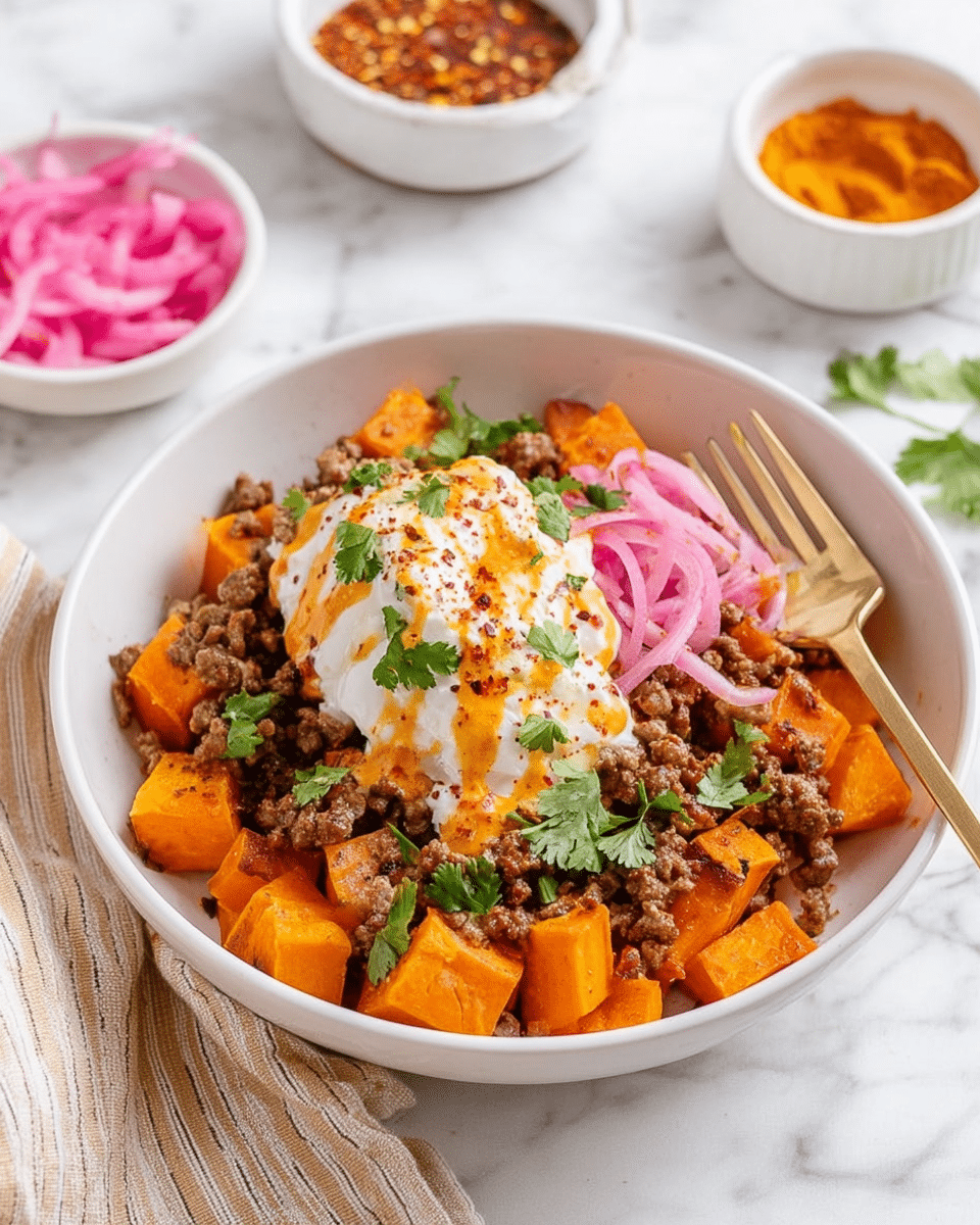 A white bowl holds a colorful dish with three visible layers: the bottom layer is bright orange roasted sweet potato cubes, the middle layer is brown cooked ground meat mixed with pink pickled onion slices scattered on top, and the top layer is a creamy white cottage cheese dollop drizzled with orange sauce and sprinkled with fresh green parsley leaves and some red spices. A gold and white fork rests on the side of the bowl. In the background, there are small white bowls, one with more pink pickled onions and one with orange spices, all placed on a white marbled surface with a beige striped cloth nearby. photo taken with an iphone --ar 4:5 --v 7