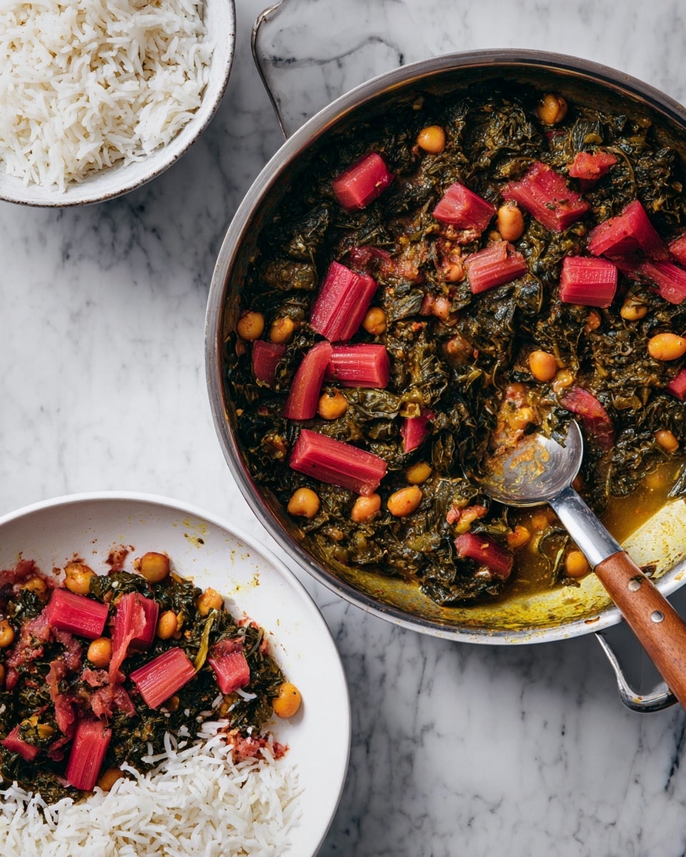 The image shows a metal pan filled with a cooked dish containing three main layers: a base of dark green leafy vegetable mixture, scattered orange beans, and several thick slices of bright red rhubarb cut in chunks on top. A silver spoon with a wooden handle rests inside the pan, slightly covered with the food. To the right, a white plate holds a serving of the dish on top of a bed of white cooked rice, with visible layers of the reddish rhubarb pieces, orange beans, and the dark green vegetable mix underneath. Part of a white bowl filled with plain white rice is also visible at the bottom of the image. The setting is on a white marbled texture. photo taken with an iphone --ar 4:5 --v 7