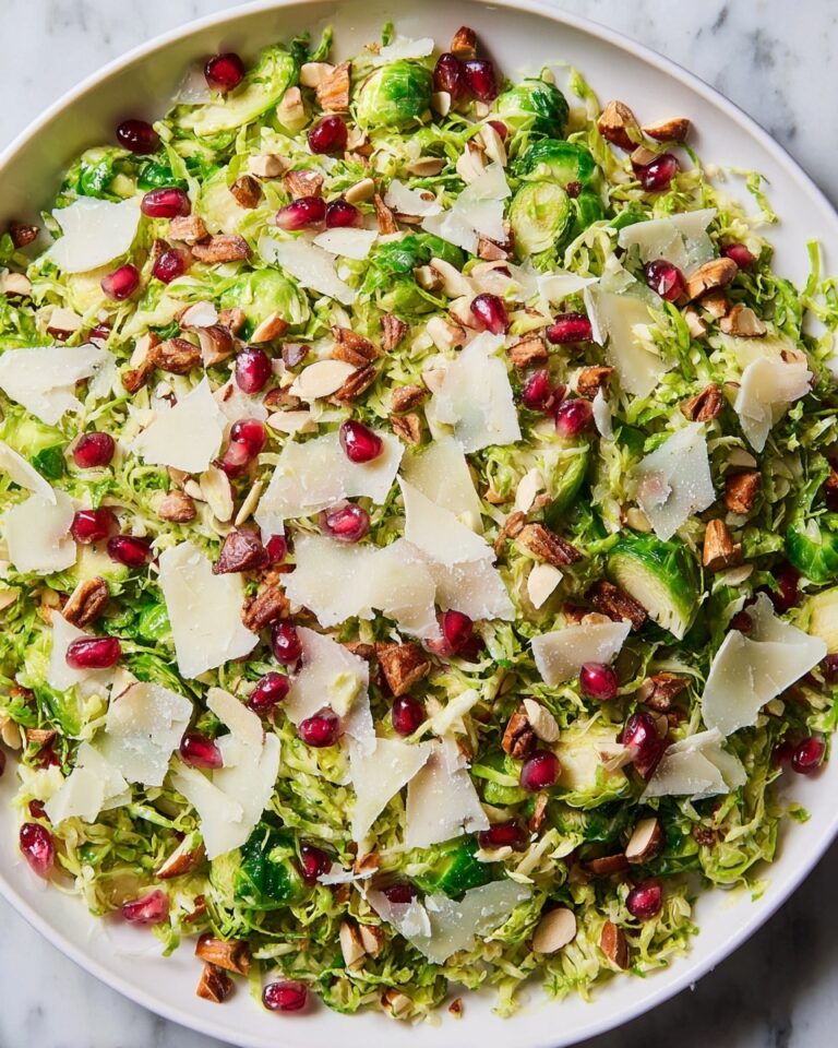Brussels Sprout Salad with Lemon, Pomegranate, and Toasted Almonds Recipe