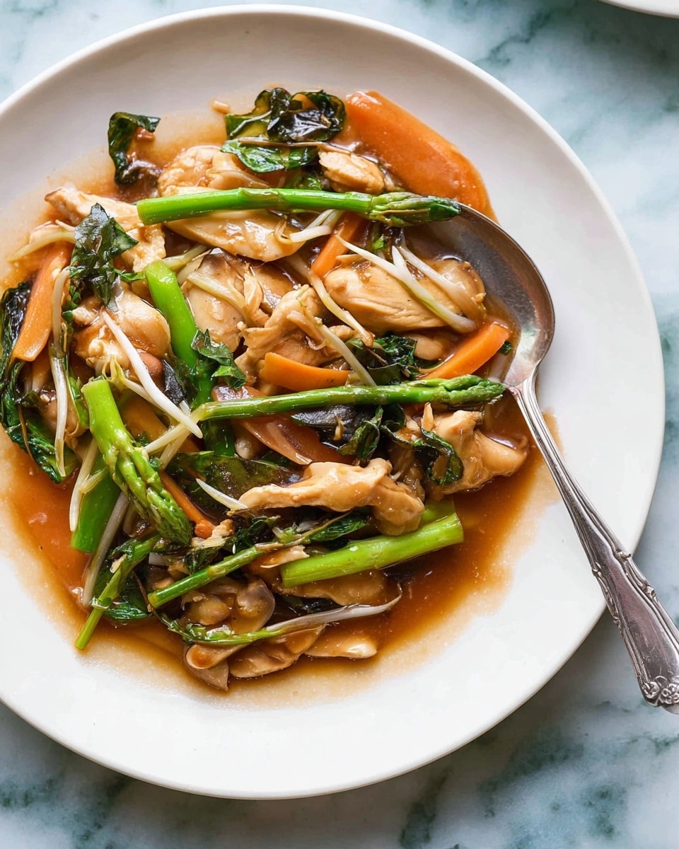 A white plate holds a dish with several layers, starting with a base of light brown, slightly glossy sauce coating thin slices of cooked chicken that are light beige with some browned edges. Mixed through the chicken are bright green stalks resembling asparagus and leafy greens, some dark and shiny, adding a fresh contrast. Thin carrot slices, orange and slightly soft, are also scattered across the plate. Small slivers of light brown mushrooms and white bean sprouts are spread throughout, all covered in the same shiny sauce. A silver spoon rests on the right edge of the plate, slightly touching the food. The plate sits on a white marbled surface. photo taken with an iphone --ar 4:5 --v 7